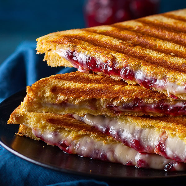 Panini with Brie, Cranberry Sauce and Caramelized Onions